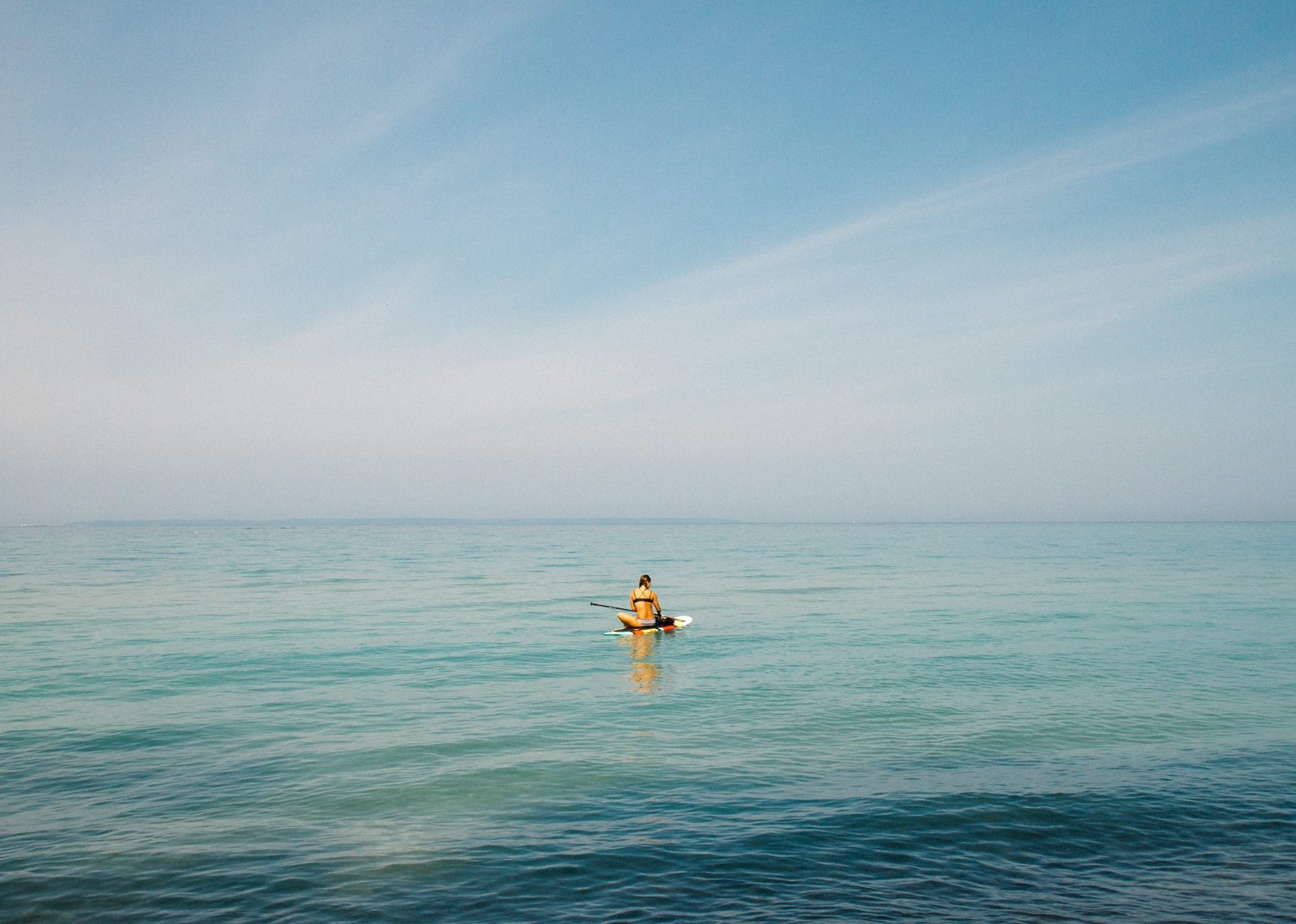Paddleboarding on calm Shinnecock Bay near Ocean View Terrace Inn, Hampton Bays, NY